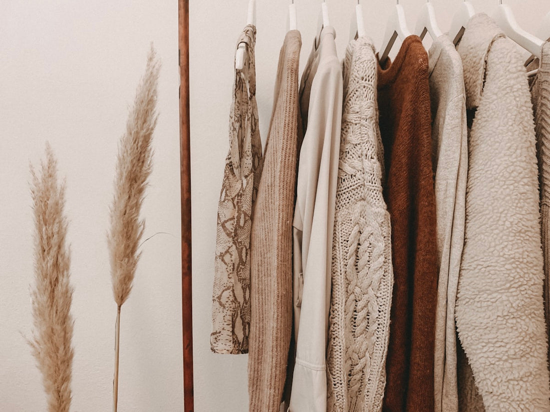 quality requirements checklist clothing manufacturer — clothing rack with garments for brand inspection