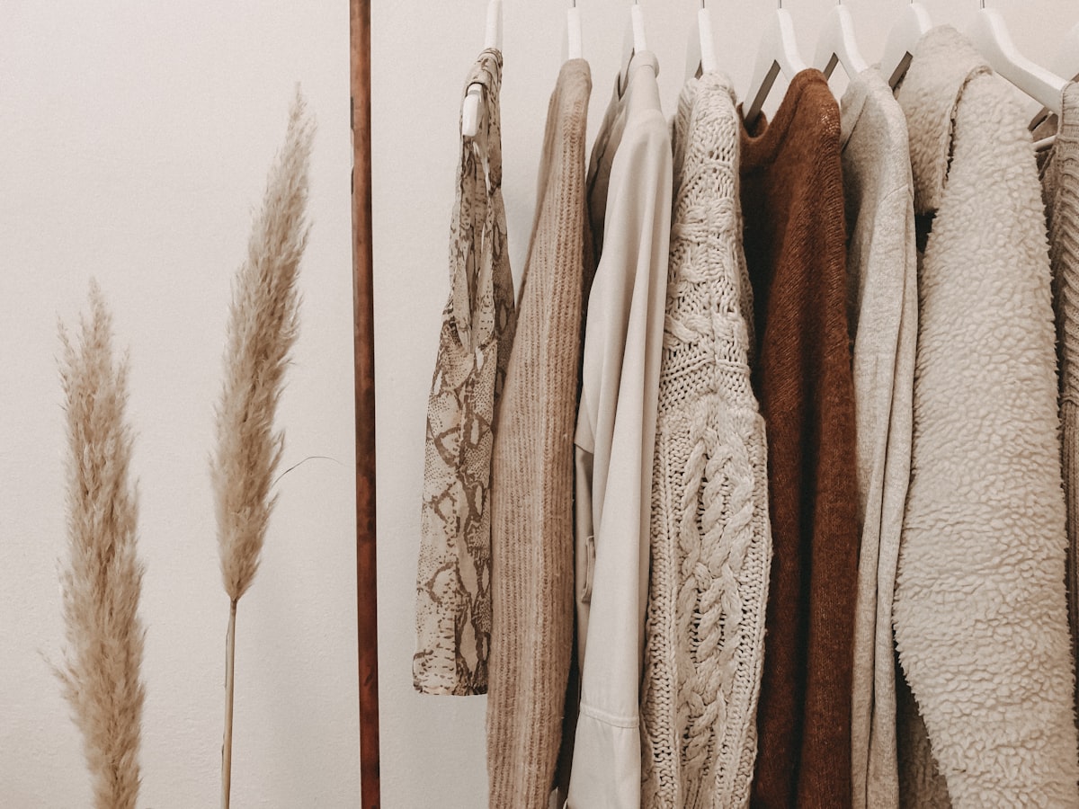 quality requirements checklist clothing manufacturer — clothing rack with garments for brand inspection