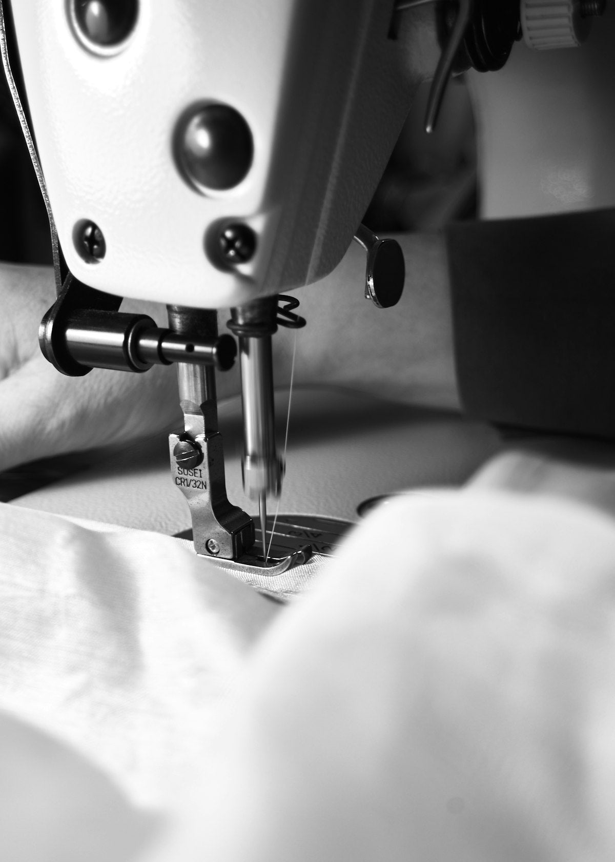 cotton t-shirt shrinkage — detailed textile fabric close-up showing cotton weave structure and fiber density